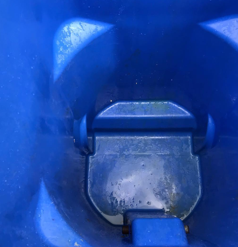 Clean trash bin after 716 Bin Wash cleaning