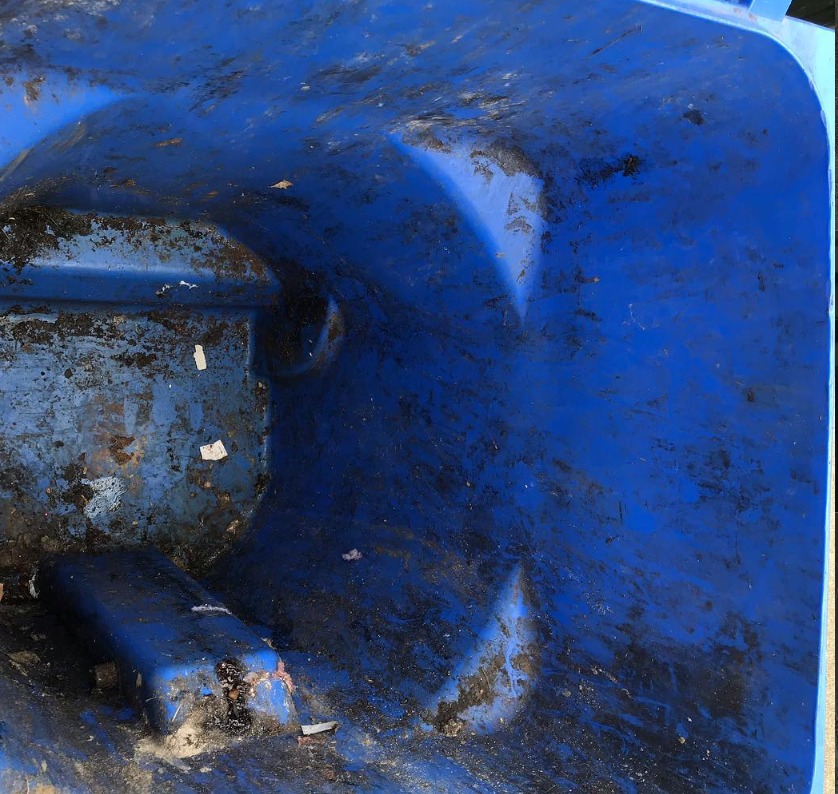 Dirty trash bin before 716 Bin Wash cleaning